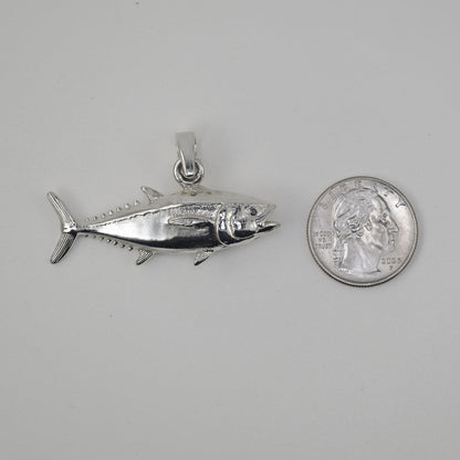 Blackfin Tuna made in sterling silver size referenced next to a quarter