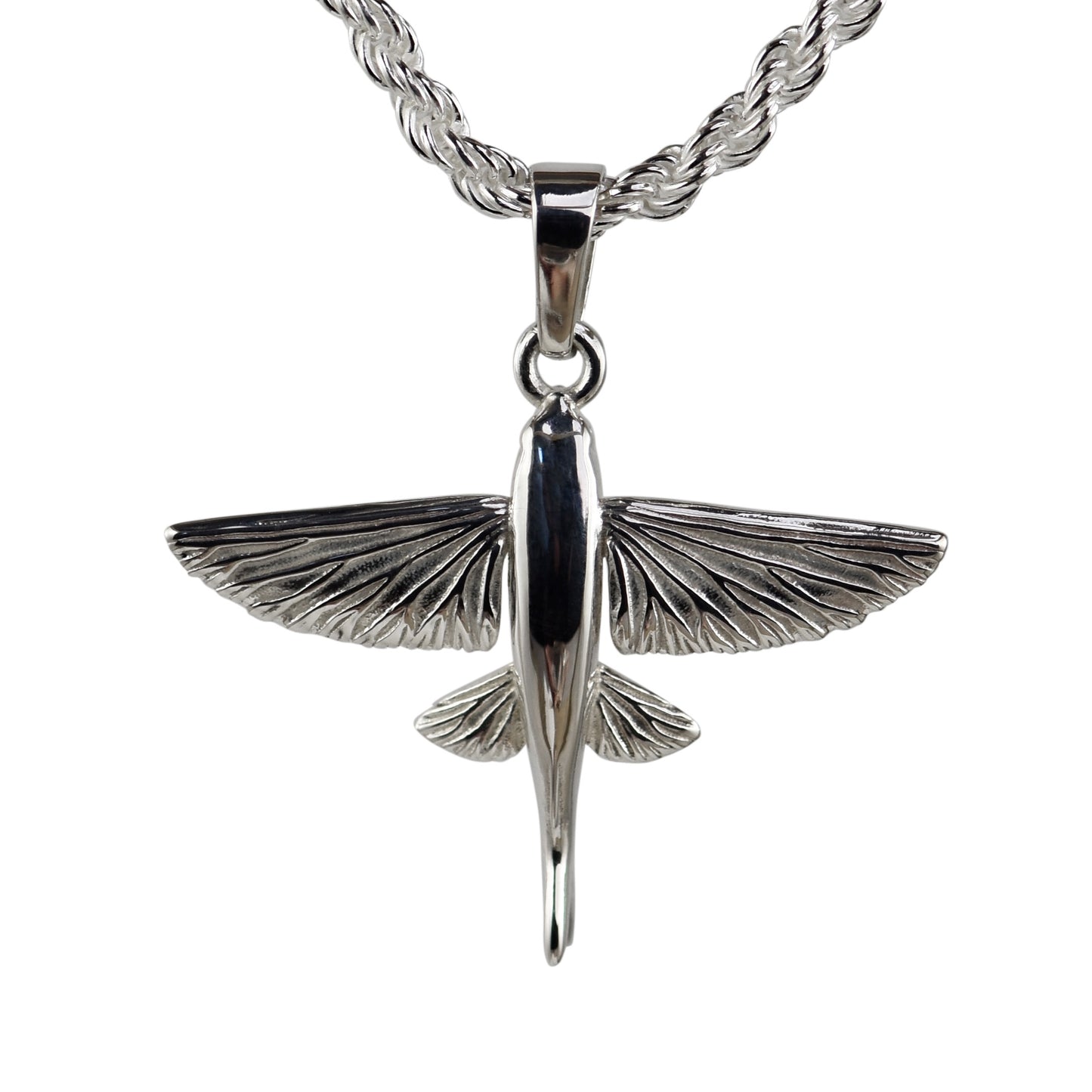 Medium Flying Fish Pendant made in solid polished sterling silver shown on a rope necklace 
