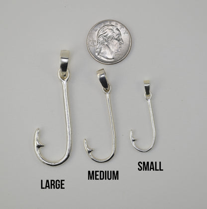 Three silver fishing hook pendants labeled LARGE, MEDIUM, and SMALL on a light gray background, with a U.S.