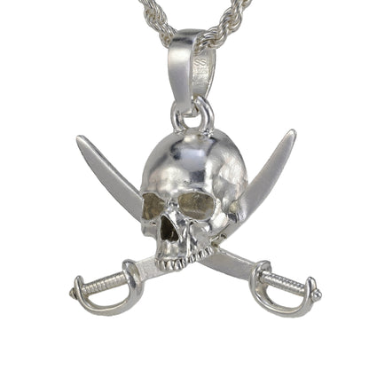 A sterling silver pendant of a skull with two crossed pirate swords behind it hung on a rope necklace. 