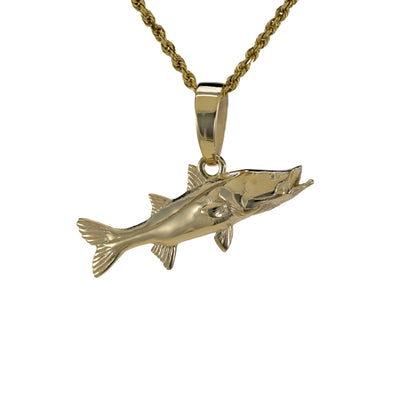 Large Snook in solid 14k yellow gold with a large bail shown on a rope necklace
