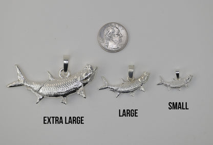 Size reference photo extra large tarpon vs large tarpon vs small tarpon vs U.S. Quarter