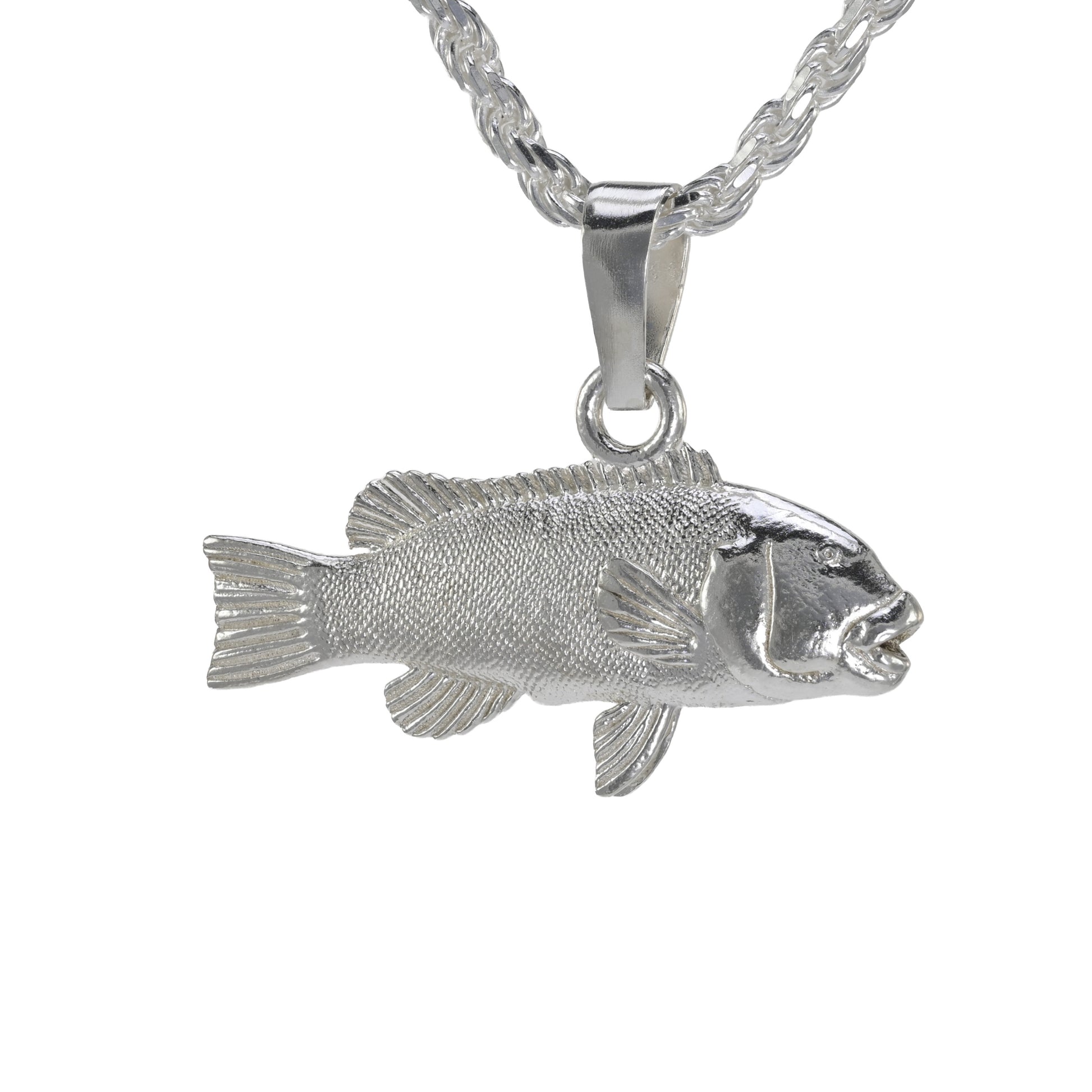 Silver  tautog fish pendant on a white background