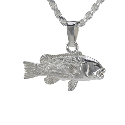 Silver  tautog fish pendant on a white background