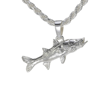 Small sterling silver snook charm shown on a rope necklace
