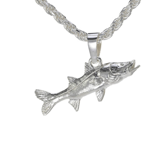 Small sterling silver snook charm shown on a rope necklace