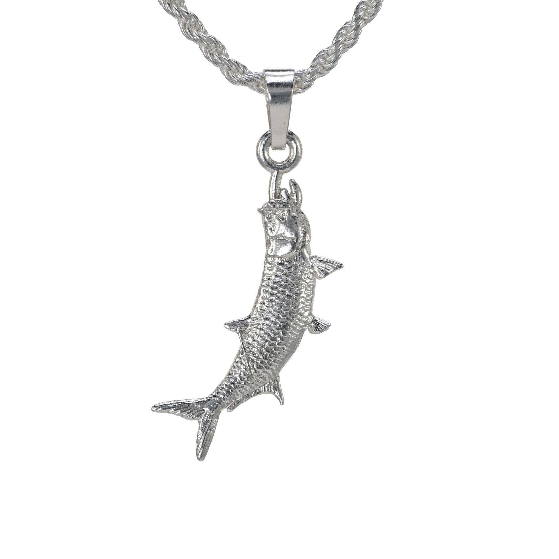 The small sterling silver tarpon pendantvertically hung shown on a rope necklace