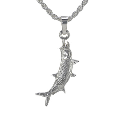 The small sterling silver tarpon pendantvertically hung shown on a rope necklace